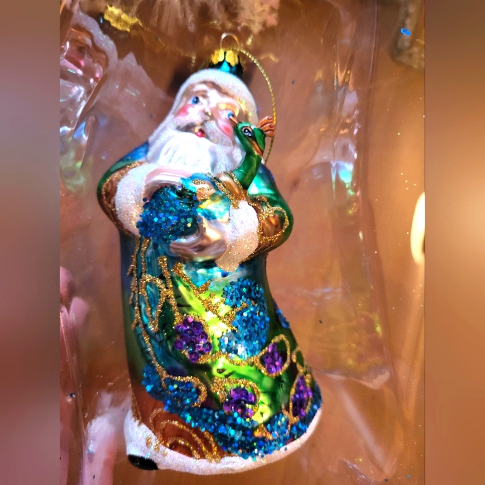 Glass santa with peacock christmas ornament